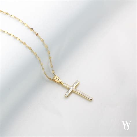 symbol kríža na šperku