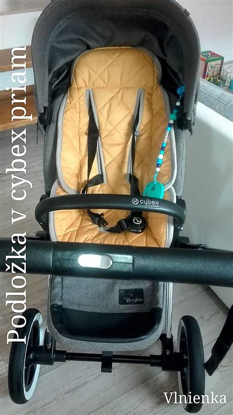 Detail 5-bodového pásu kočíka Cybex